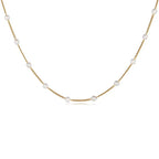 Women's necklace with pearl-embroidered pendant.